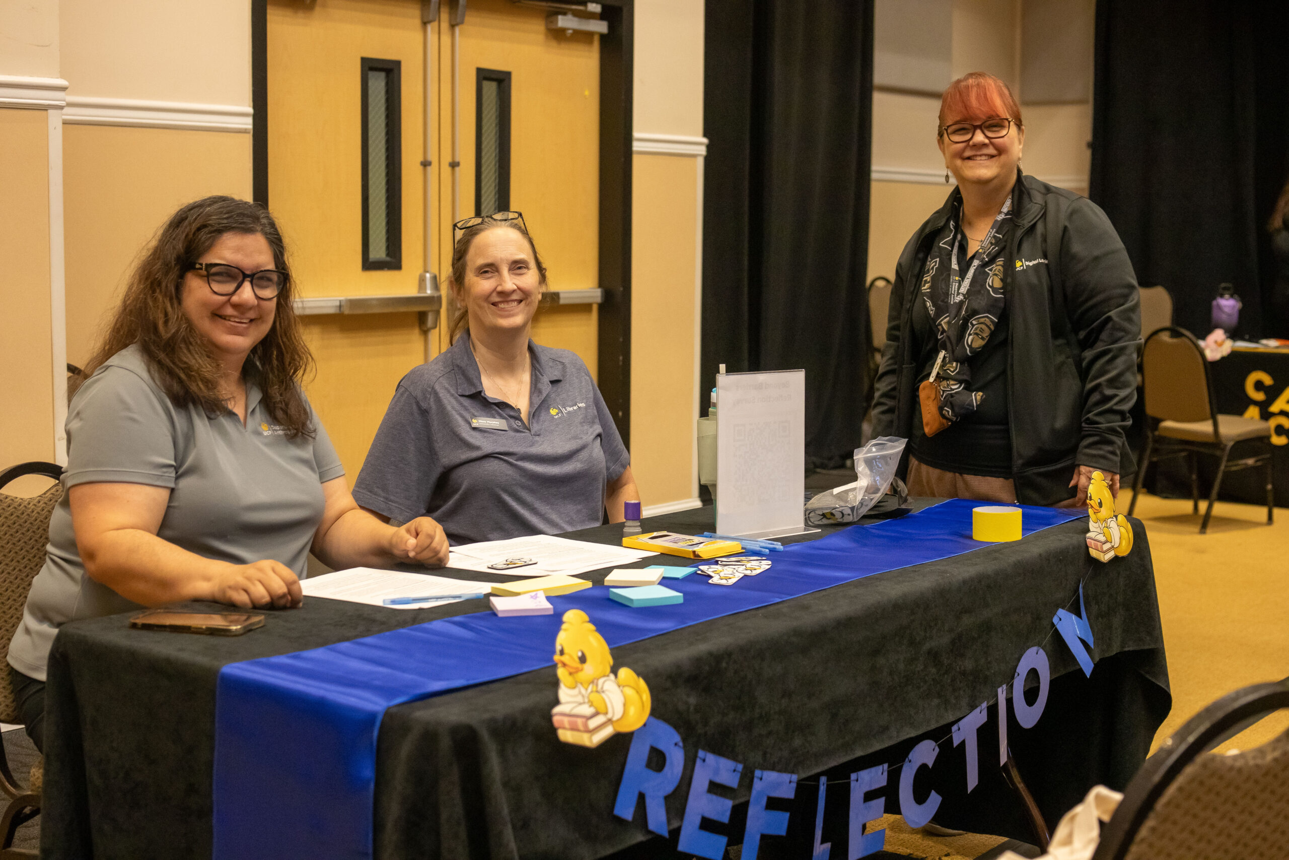 Reflection station facilitators posing for a photo