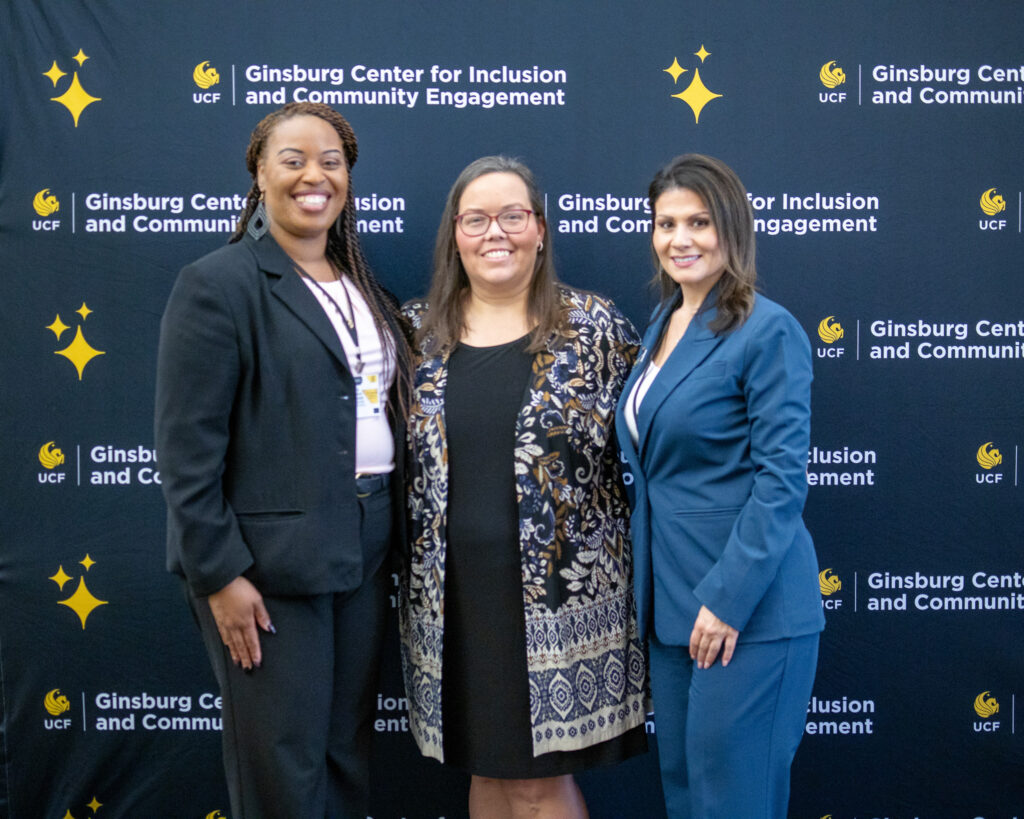 a group photo of administrators with a keynote speaker